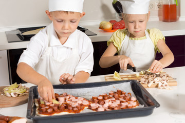 Cute Little Kids in Chef Attire Making Pizza