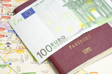 passport with bank notes and map