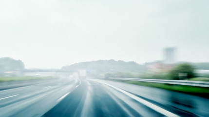 Driving on a Freeway on a Rainy and Misty Day