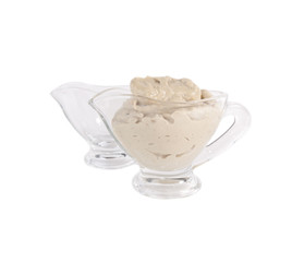 Aubergine paste in glass bowl isolated over white