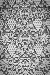 Ornament from grapes, grape leaves on wall of church