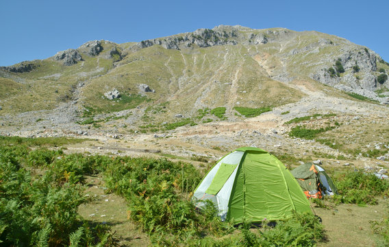 green tent on the mountain - summer time © sea and sun