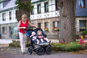 Woman with double stroller