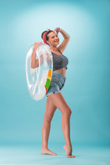 Beautiful girl in pinup style with inflatable