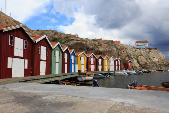 Boathouses at famous Sm&ouml;gen bridge in Bohusl&auml;n, Sweden.