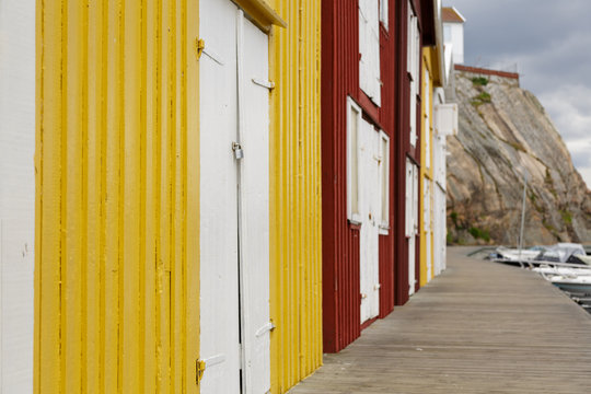 Boathouses at famous Smögen bridge in Bohuslän, Sweden.