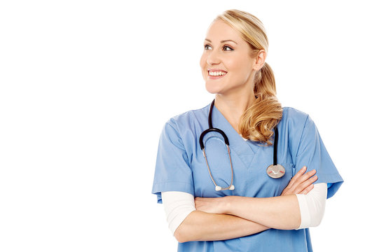 Confident female doctor over white background
