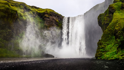 Landscape view of wild Skogafoss waterfall in Iceland