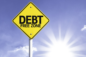 Debt Free Zone road sign with sun background