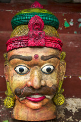 Old vintage head of statue in wood from Rajasthan in India