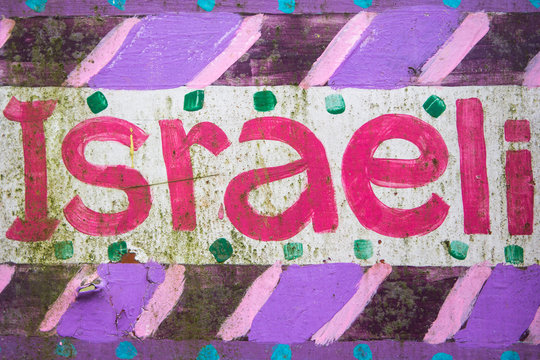 Word Israeli painted on a wooden board