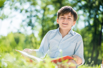 Boy in summer park