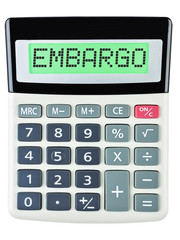 Calculator with EMBARGO on display isolated on white background