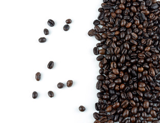 Brown roasted coffee beans isolated on white background