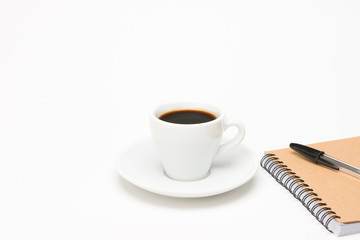 Cup of coffee with notebook
