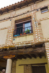 beautiful old balconies decorated with flowers and wood in Areva