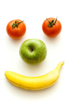 Happy face with fruits