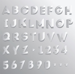 Paper cut and folded alphabet and numbers