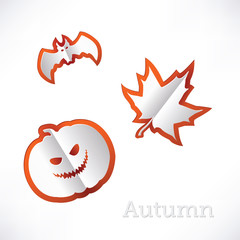 Autumn background with leaves, pumpkin and bat origami