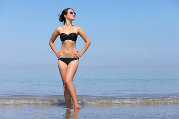 sexy girl in a swimsuit at the sea