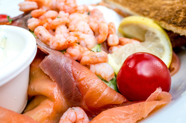 Fresh salmon salad with tomatoes