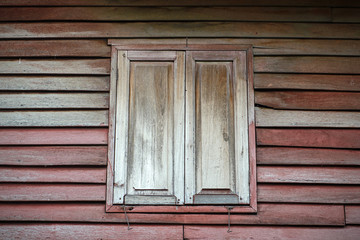 Obraz na płótnie Canvas wooden old home wall and windows