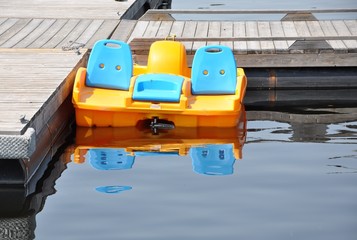 Paddle boat in a wooden dock