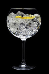 Gin tonic cocktail on black background