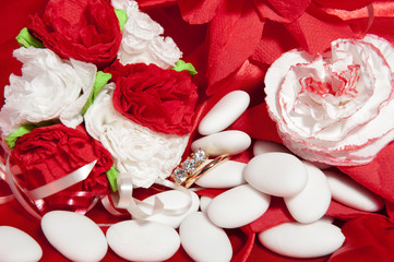  wedding rings on colorful fabric