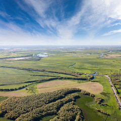 Fototapeta na wymiar Top view above fields beside the river