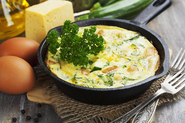 Baked zucchini with chicken and herbs