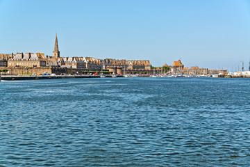 Fototapeta na wymiar The port of Saint Malo with blue sky. Brittany. France.