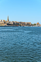 Naklejka premium The port of Saint Malo with blue sky. Brittany. France.