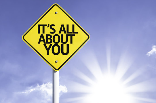 It's All About You Road Sign With Sun Background
