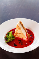 cheesecake with berry sauce