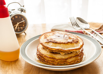 Pancakes on Dish with Honey