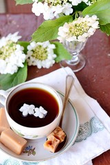 Cup of tea and flowers
