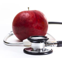 Apfel und Stethoskop