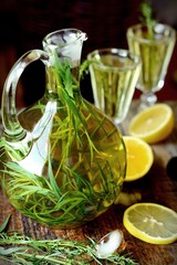 Green estragon lemonade pitcher a wooden table