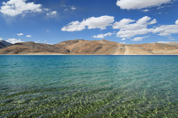 Fototapeta na wymiar Pure mountain lake with transparent water