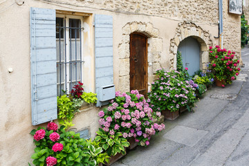 Provencal street with typical houses in southern France, Provenc