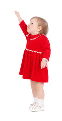 Pretty little girl in a red short dress isolated on white backgr