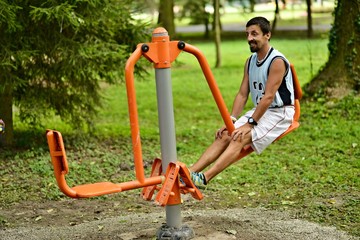 Man exercising in a public park