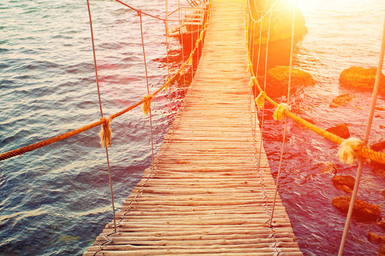 Rope Bridge At Sunset