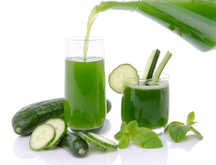 Composition with cucumber juice poured into a glass