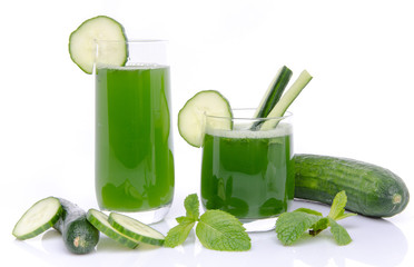 Composition with two glasses and a jug of cucumber juice, fresh