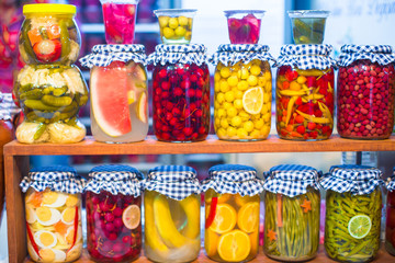 Fototapeta na wymiar Mediterranean pickled vegetables and fruits on the open market