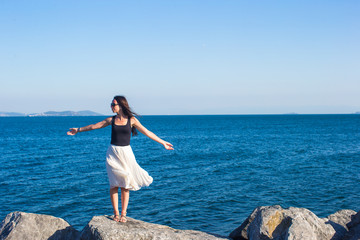 Young attractive woman during summer vacation near Bosphorus