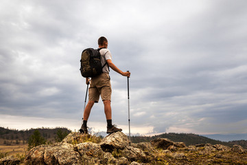 Backpacker looking at the sky