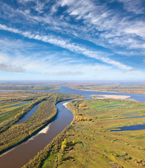 Fototapeta na wymiar Great river in autumn, top view